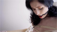 Miss Ellie Mouse – Fully Naked Brunette With a Gag in Her Mouth Tied With Ropes